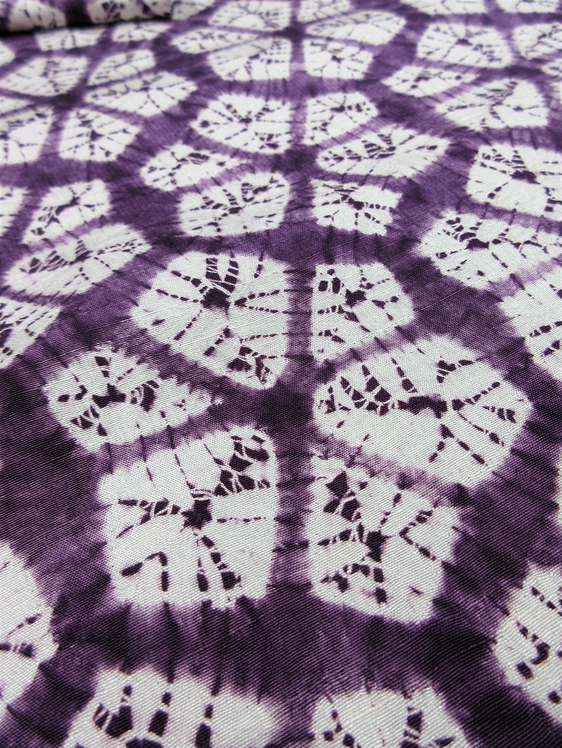 紫根 貴重な紬九寸名古屋帯 絞り染で表したお洒落なデザインが着物姿を 