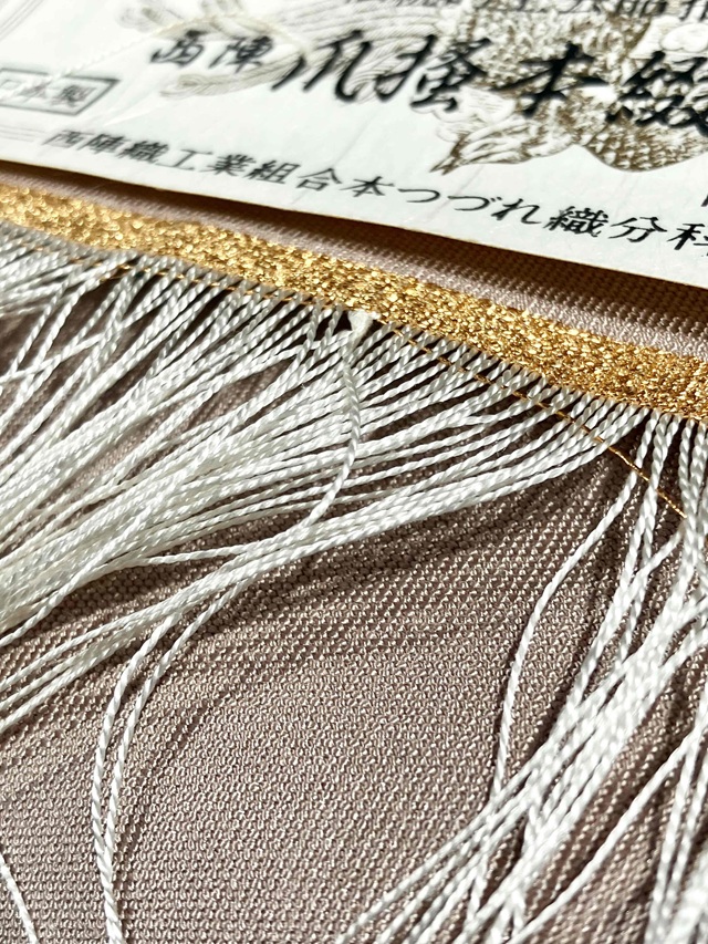 爪搔き本綴れ